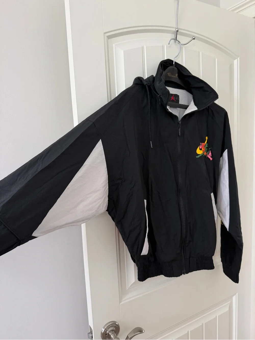 Jordan Black Hooded Windbreaker with Multicolor Logo Accent